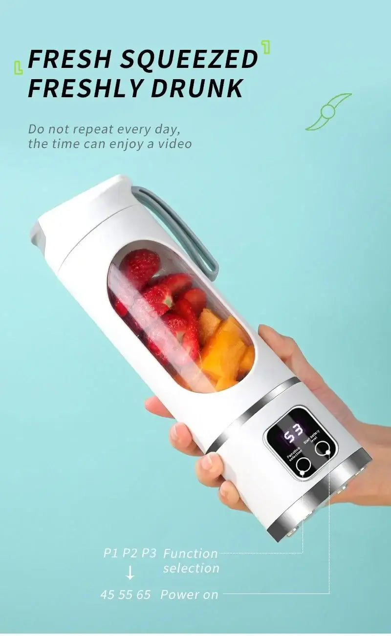 Portable electric juicer with fruit, digital display, and multifunction settings for fresh smoothies and juice.