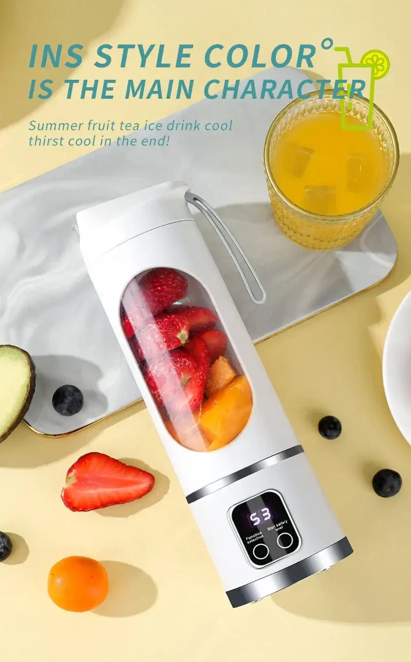 Portable electric juicer blending colorful fruits with digital display, perfect for smoothies and fresh juice on-the-go.