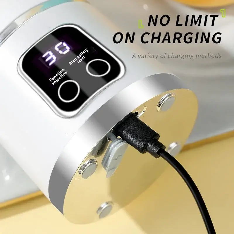 "Electric juicer mini portable blender charging with digital display screen showing settings."