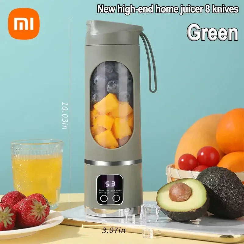 Green portable electric juicer with fruit inside, featuring an 8-blade system for smoothies and fresh juice.
